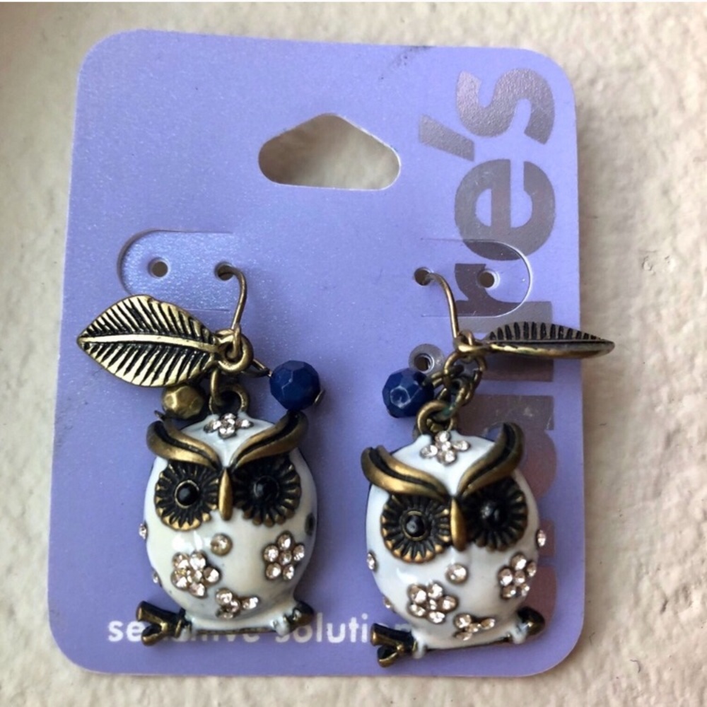 Claire’s White and Bronze Owl Dangle Earrings